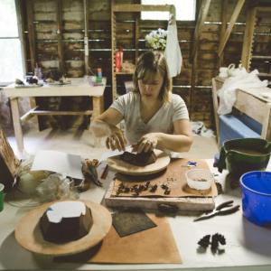 An artist working in Watershed’s clay studio. Courtesy photo