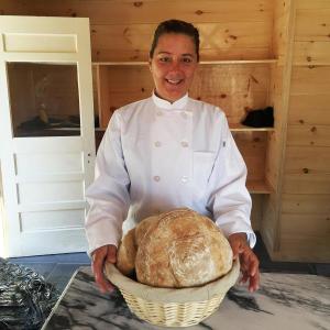 Anna Jansen shows off some of her freshly baked boules, which she’ll be making and selling in her new bakery/shop in Damariscotta. SUZI THAYER/Boothbay Register