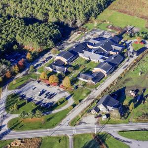 An aerial view of the Wiscasset Primary School property on Gardiner Road. At right is Morris Farm, a key player in a proposed charter school that organizers would like to house at the primary school. Courtesy of Dave Cleaveland Wiscasset Primary School
