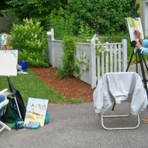 Guest artists set up their easels at the Kilburn Gallery for the three-day “Guests on the Lawn” art sale and show. The August event, the second of three, will be held Aug. 14-16. Courtesy of Amy Kefauver