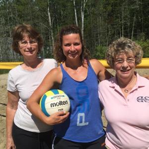 From left, Mary Nickerson, Julie Jones and Sharon Snell take a moment on Jones’ Olympic-sized volleyball court Aug. 28. The three and other family members are among the volunteers for the Dean Snell Foundation named for Snell’s late husband. The court on Suki Lane in Wiscasset is the venue for a fundraiser tournament for the foundation on Sept. 19. SUSAN JOHNS/Wiscasset Newspaper Mary Nickerson, Julie Jones, Sharon Snell, volleyball, Suki Lane, Wiscasset, Dean Snell Foundation, cancer