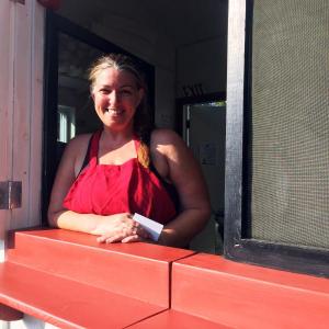 Christine Schweighauser's smile is almost as big as her portions, as she welcomes people to her new food stand on Main Street in Damariscotta, The Cook’s Corner. SUZI THAYER/Boothbay Register