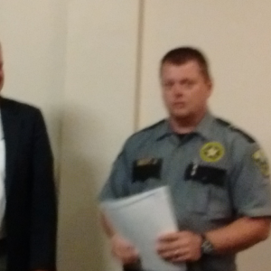 Two Bridges Regional Jail Authority Chairman Mark Waltz congratulates Captain James Bailey for 10 years of service. JANE CARPENTER/Boothbay Register