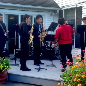 Liz Matta directs the Lincoln Academy Jazz Combos at the Champagne on the Sheepscot event. Courtesy of Wendy Ross Eichler