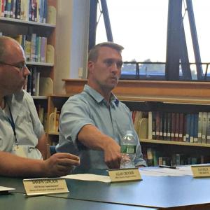 Boothbay Region High School Principal Dan Welch, right, explains the new extracurricular eligibility policy to the Community School District School Committee at a Sept. 9 meeting. Athletic Director Allan Crocker, left, looks on. KATRINA CLARK/Boothbay Register