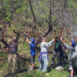 Boothbay Region High School students and staff participate in a 2012 SVCA pruning project. Courtesy photo