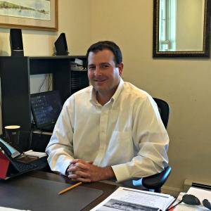 Tony Cameron in his soon-to-be-vacated office at the Boothbay Harbor Region Chamber of Commerce. KATRINA CLARK/Boothbay Register