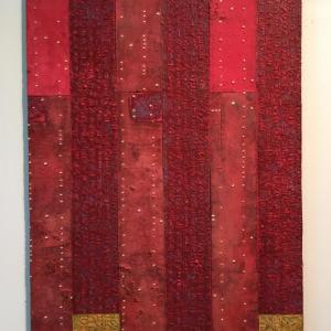“With Vertical Lines,” 2014, plaster, burlap, casein paint, encaustic, 28.5 by 17.75 inches, George Mason.