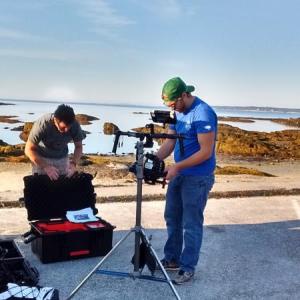 Cinematographer Rafael de la Uz, left, prepares to film sunrise at Hendricks Head beach for a PBS Rachel Carson program. JANE CARPENTER/Boothbay Register