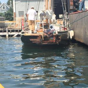 The Lazy Jack ties up at Boothbay Harbor Shipyard after getting hit by a lobster boat on Wednesday afternoon. Courtesy of Bruce White
