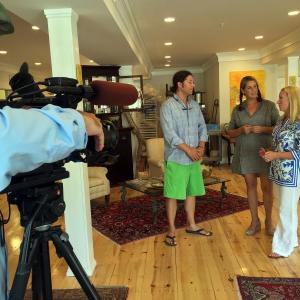 Cameraman and producer of New England Boating TV sets up a scene for an interview at Alison Evans Ceramics in Boothbay Harbor on Sept. 3. Journalist and co-host of the program Parker Kelley, far right is interviewing Chris Fritz and Alison Evans for the show. SUZI THAYER/Boothbay Register