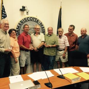 The Community Energy Fund’s three founders were awarded the Spirit of America Award from the town of Damariscotta during the Sept. 2 meeting. Pictured, from left: Charlie Ault, Selectmen’s Chairman Robin Mayer, Robert Clifford, Selectman Ronn Orenstein, Todd Maurer, Selectman George Parker, Selectman James Cosgrove and Selectman Joshua Pinkham. BEN BULKELEY/Wiscasset Newspaper