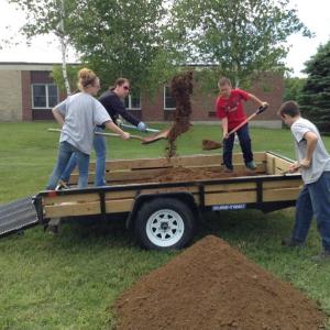 ABLE students prepare to build raised garden beds. Courtesy photo