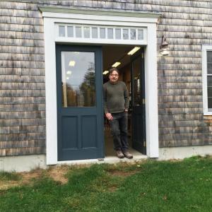 Jeff Koopus stands in the doorway of his shop on Cross Point Road in Edgecomb. SUZI THAYER/Boothbay Register