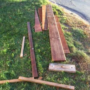 A small stack of old bleacher boards behind the BRHS gym, already picked over by alumni looking for souvenirs. KATRINA CLARK/Boothbay Register