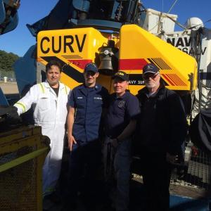 National Transportation Safety Board marine safety investigator Tom Roth-Roffy with others Oct. 19, prior to departing on the Navy ship Apache to search for the El Faro wreckage and the voyage data recorder. (Courtesy NTSB)