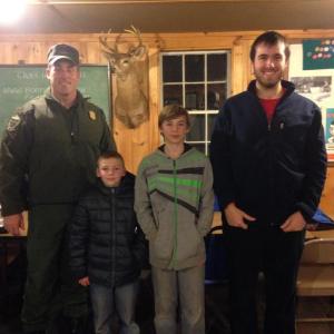 Maine Warden Justin Fowlie with Boy Scout Troop 238 members, from left, Webelo, Gabe Barter; 2nd Class Scout, Ethan Barter; and Life Scout, Jacob Bishopp. Courtesy of Sarah Sherman