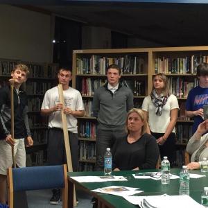 Members of the “Making and Marketing” class at BRHS present their company, dubbed the “Boothbay Paddle Company” to the CSD School Committee on Nov. 4. From left are Joe Paolillo (design and engineering), Nick McCullough (quality control), Camden Spear (marketing), Anna Baumm (marketing), and Nick Gorey (finance). Sitting are committee members Stephanie Hawke and Sandy Paxson. KATRINA CLARK/Boothbay Register