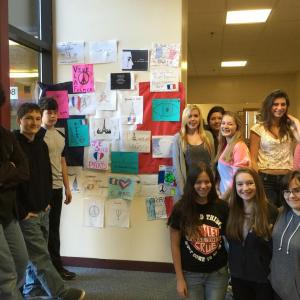 Students in one of Madame Gorey's classes stand around the artwork they helped create. From left, front row: Kylie Michael, Sierra Murray, and Isabelle Curtis; back row: William Berry, Zach Blackman, Samuel Burnham, Tayla Lewis, Rebecca Taylor, Kayla Lewis, Angie Perkins and ReAnna Heino. Not pictured: Tori Morin. KATRINA CLARK/Boothbay Register