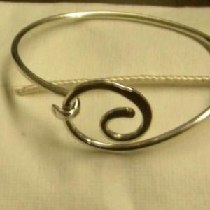 This silver bracelet made and donated by Kate Schwehm is one of the many items being offered in the Splash into Science group’s online auction.