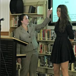 Molly Thibault, left, playing Christian Heyne from the Coalition to Stop Gun Violence, gestures to facts about gun violence on her joint presentations with Angie Perkins, playing Josh Horwitz of the same organization. KATRINA CLARK/Boothbay Register