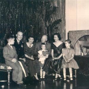 The first family 1954. President Dwight D. Eisenhower and his family were gifted with the Nativity shadowbox in the background, right, by Raymond Pitcairn who commissioned Hanna Weil Fischer Binder to carve the human figures. Courtesy of York Fischer