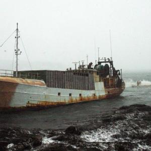 Fuller Marine pulls the F/V Westward off the rocks during a January 2015 storm. File photo