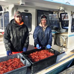 Bill Sherburne, right, and sternman Zak L’Heureux brought in a pretty good catch on Feb. 9. SUZI THAYER/Boothbay Register