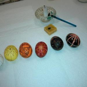From egg to pysanky. These eggs show the steps in the process of making Ukrainian decorated eggs. Also pictured are the beeswax and stylus. JANE CARPENTER/Boothbay Register