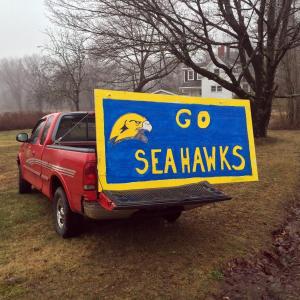 A sign on the back of John Leonard’s pickup truck on Route 27 in Boothbay. SUZI THAYER/Boothbay Register