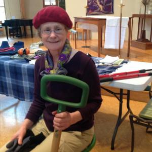 Ellen Gibson from Maine AgrAbility demonstrates some assistive technology for gardening at the March 9 meeting of the Boothbay Region Garden Club. Gibson is sitting aboard a rolling swivel chair and holding a wide handled shovel designed specifically for women. Among other helpful tools there is a garden bench that doubles as a kneeling pad when turned upside down and a telescoping rake and hoe. Courtesy of Linda Redman