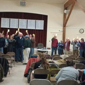 ““Yes votes near the kitchen and no votes near the piano.” Southport residents vote at town meeting. JANE CARPENTER/Boothbay Register