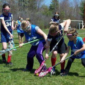 YMCA lacrosse action in grades 3 and 4. Courtesy photo