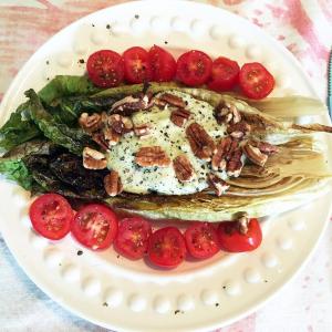 Grilled romaine lettuce can be served naked, or any way you please. Here it’s sitting pretty with grape tomatoes, a creamy lemon dressing and pecans. SUZI THAYER/Boothbay Register