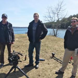 Cody Mitchell, left, Ryan Leighton and Brian Papineau, the production team behind the Boothbay-based online television series Era Man, prepare to shoot a scene on a recent afternoon at Barrett’s Park in Boothbay Harbor. The trio has recently completed the third episode of the coming of age show and plan to film six in total. SUZI THAYER/Boothbay Register
