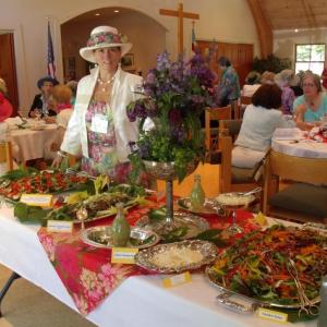 BRGC member Abbie Shaw pictured with the lovely and satisfying lunch catered by Abbie Boody Shaw Fine Cuisine for the Boothbay Region Garden Club Annual Meeting and Luncheon, 2016. Courtesy of Kathleen Marty