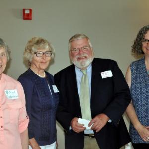 Auxiliary President Carol Ostermann (far left) and Treasurer Carol Lingard present a donation of $2,000 on behalf of St. Andrews Auxiliary to John Welsh and Melissa Arndt of LifeFlight Maine. Photo courtesy of Linda Redman.