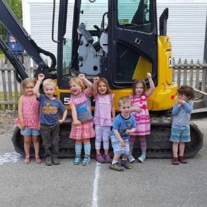 Students enjoy a tour of Jody Lewis’ excavator. Courtesy photo