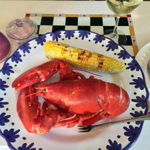 A lobster dinner should consist of lobster, corn on the cob, grilled here, some good bread, and wine. SUZI THAYER/Boothbay Register