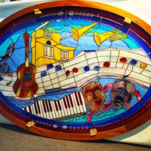 Local stained glass artisan Richard Macdonald’s new window for the Opera House at Boothbay Harbor. SUZI THAYER/Boothbay Register