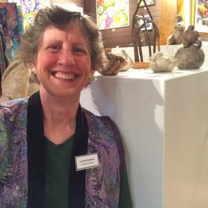 Artist Laura Freeman with her sculptures on display at Stable Gallery in Damariscotta in July. Courtesy of Polly Smith Maine artist Laura Freeman & sculptures