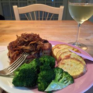 A pork chop, pan fried with Morse’s sauerkraut, some roasted Yellow Gold potatoes, steamed broccoli with olive oil and garlic, and a glass of cold chardonnay, made for a scrumptious dinner in the Thayer household. SUZI THAYER/Boothbay Register