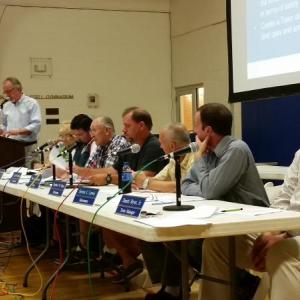 Stephen S. Sawyer Jr., left, vice president of transportation services at Sebago, addresses the crowd. Beginning second from left are secretary Sherry Tibbetts, Selectman Chuck Cunningham, Vice Chairman Douglas Burnham, Chairman Dale Harmon, Selectman Stephen Ham, Selectman Steven Lewis, and Town Manager Daniel Bryer Jr. KATRINA RICKERMANN/Boothbay Register