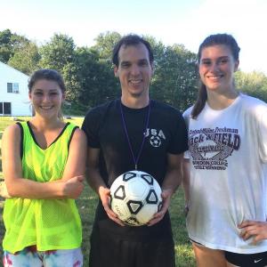 Boothbay Region High School girls soccer coach Ben Powell flanked by senior co-captains Colette Bertin (left) and Angelique Perkins. MATTHEW STILPHEN/Boothbay Register