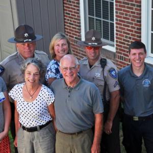 Sometimes it takes a team to save a life. Members of Chris Frost’s team include, from left, front row: LincolnHealth Registered Nurse Amy Tucker, Anne Frost and Chris Frost; back row: Lincoln County Sheriff’s Office Sgt. Alan Shea, Maine Medical Center Registered Nurse Jennifer Carlson, Lincoln County Sheriff’s Office Deputy Brian Collamore, Central Lincoln County Ambulance Service EMT-A Devan Clark and Central Lincoln County Ambulance Service EMT-A Emily Wells. Courtesy of LincolnHealth