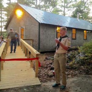 Draco Peaslee talks about his Eagle Scout project – building a new set of steps and ramp – at the Boothbay Region Fish & Game Club in Boothbay. A ribbon-cutting ceremony for the project was held Sept. 21. Courtesy of Sarah Sherman