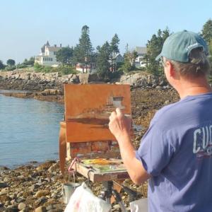 Oil painter Ed Buonvecchio of Manchester incorporates local homes in his seascape. ART MAYERS/Boothbay Register