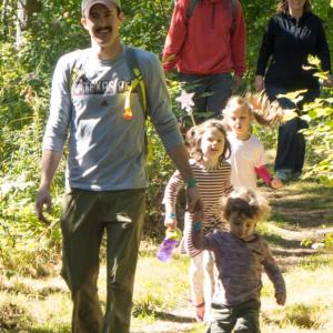 Boothbay Region Land Trust hikers enjoy the trails of Oven’s Mouth Preserve before a BBQ and live music at the adjacent private farm during The Great Hike. Courtesy of BRLT
