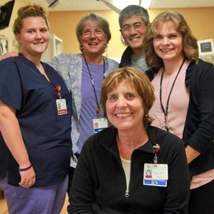 Rachel Manning, RN (seated) with members of the Urgent Care Center team at the St. Andrews Campus of LincolnHealth. Behind Manning (left to right) are Robyn Ham, Emergency Department Technician, Joanie Rioux, RN, James Li, MD, and Urgent Care Center Manager Carole Sharkey, RN. Courtesy of LincolnHealth