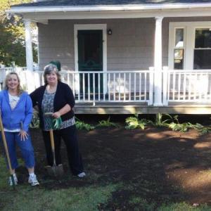 Toni Lowery, left, and Sandy Paxson work outside Griffin Law Offices. Courtesy photo